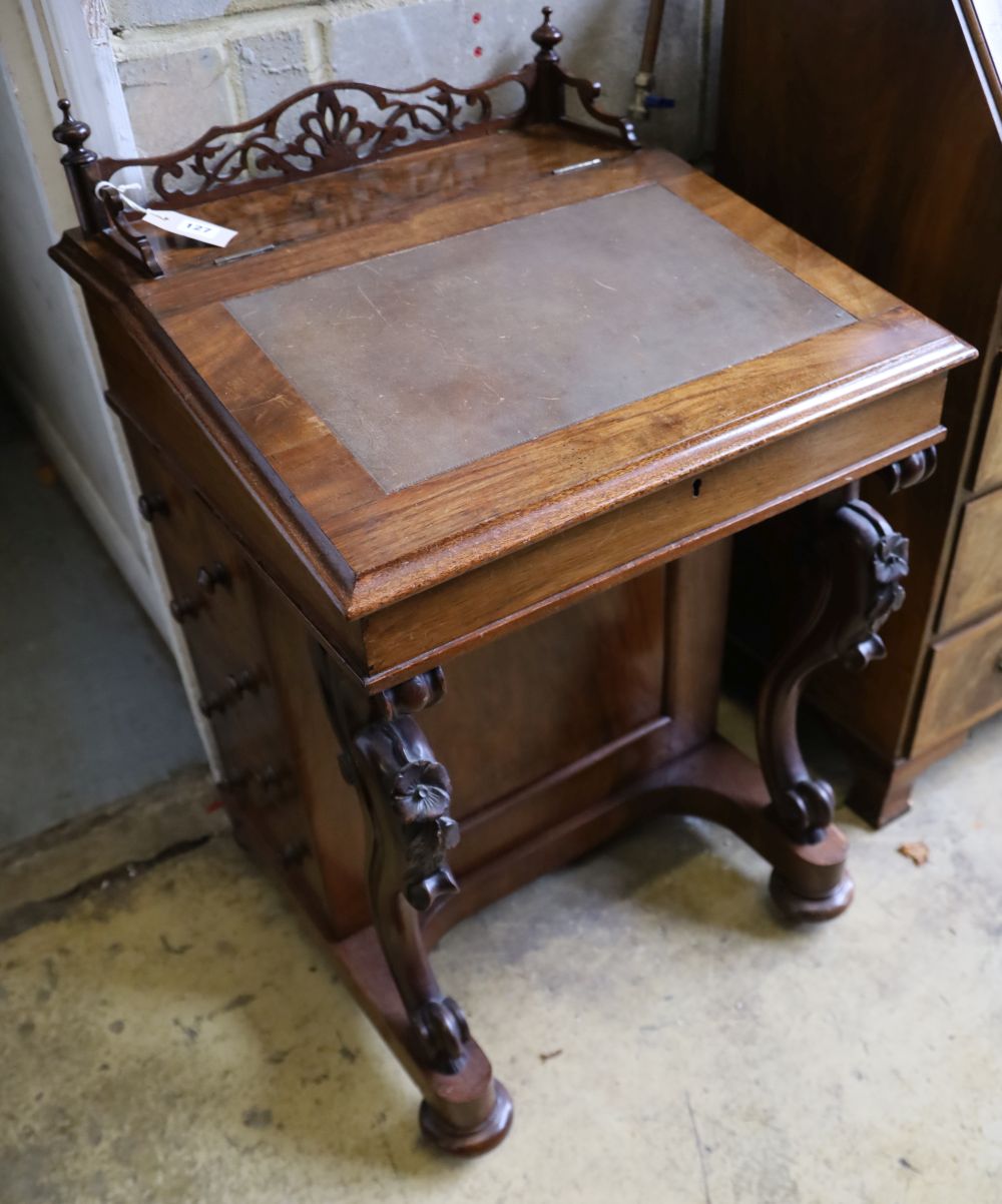 A Victorian figured walnut Davenport, width 56cm, depth 56cm, height 90cm